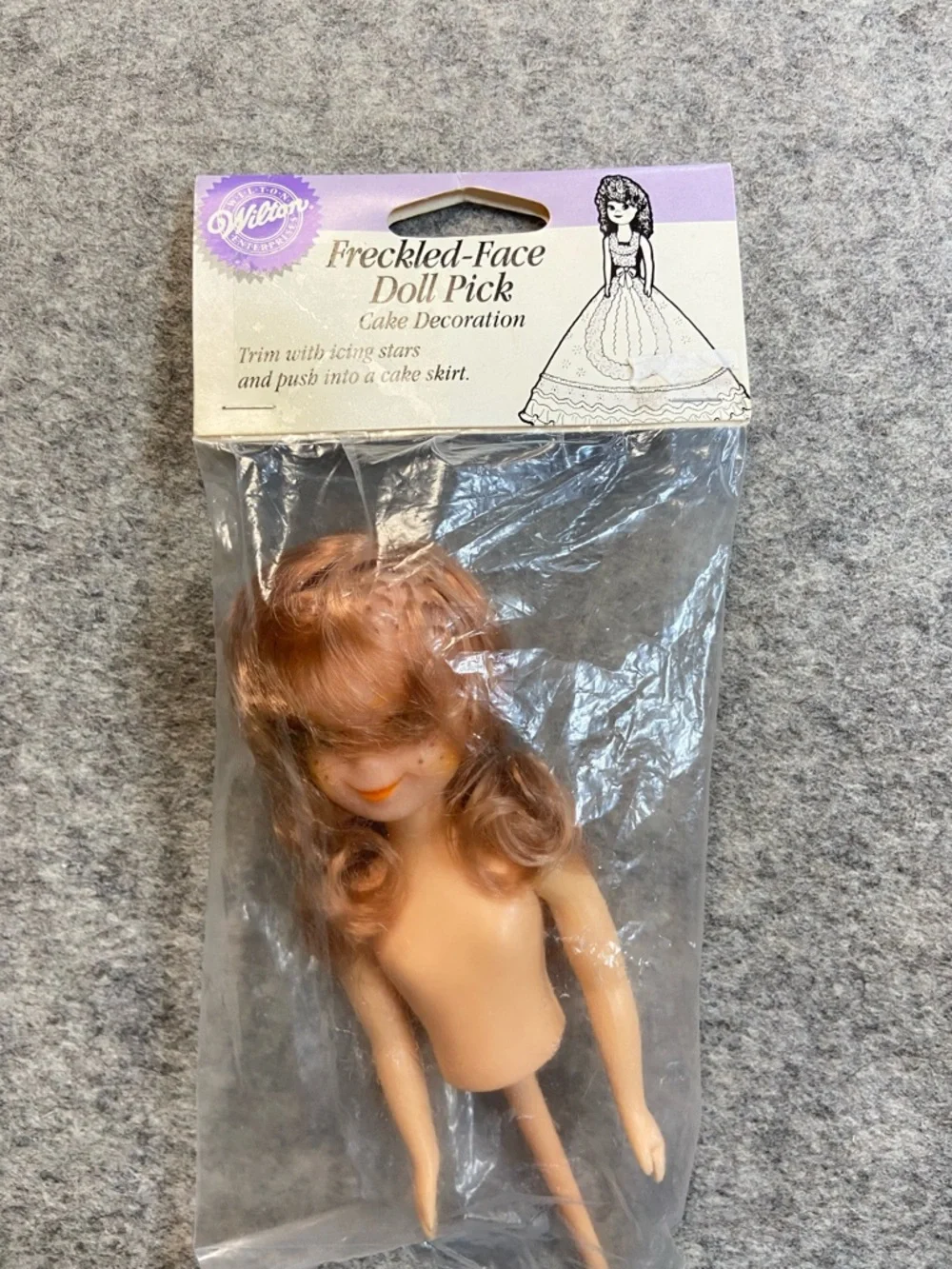 Wilton Freckled-Face Doll Pick Cake Topper - Peach Skin with Brown Hair